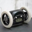 Reloj despertador digital inteligente con ruedas que reproduce un sonido potente y ruidoso.